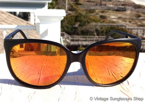 orange reflective sunglasses.